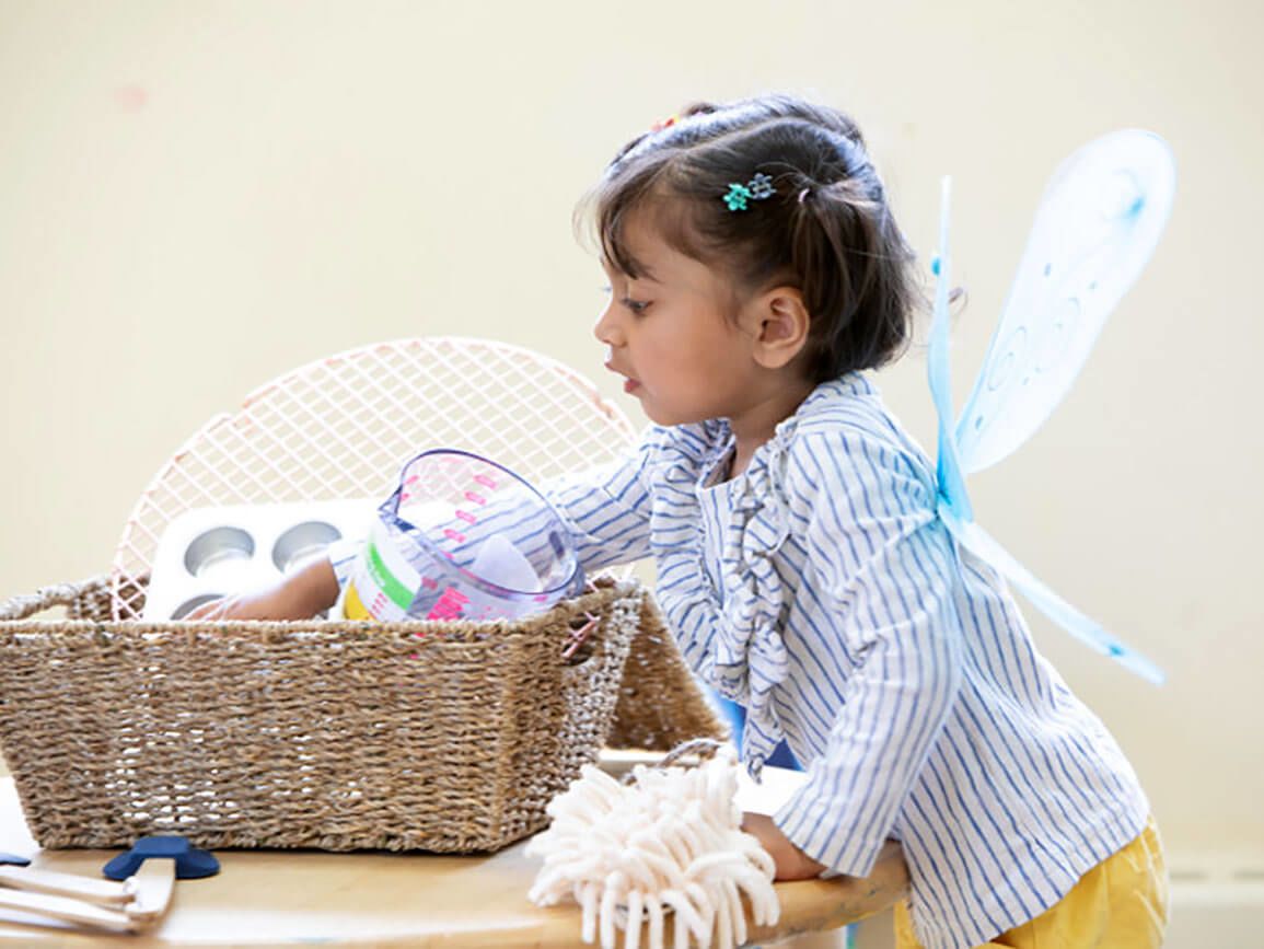 Preschooler engaging in pretend play