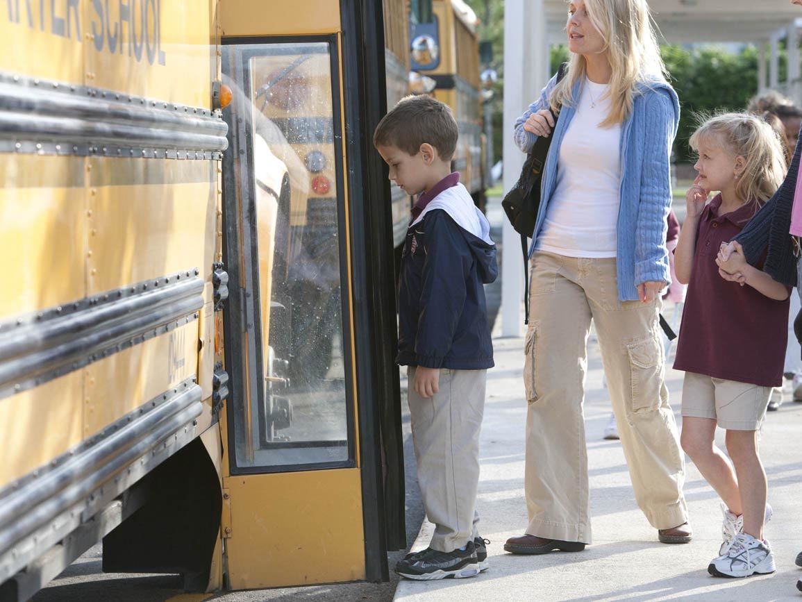 Children getting on the bus