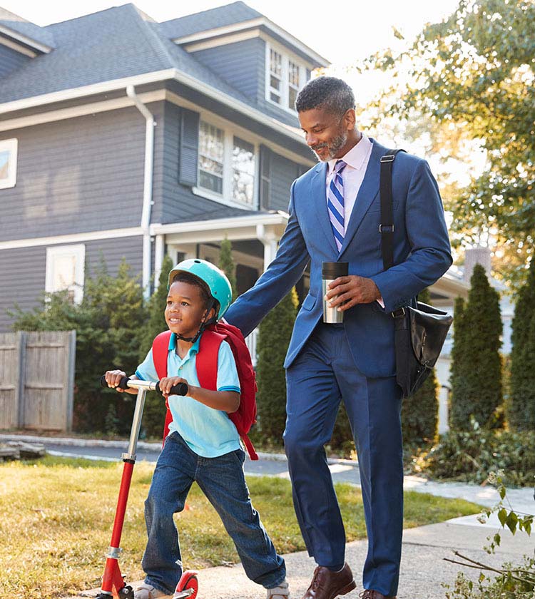 Bright Horizons Modern Family Index Man Going to Work with Child Playing in Yard