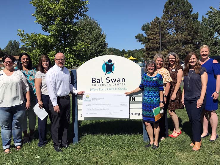 Bright Horizons Foundation for Children presents a Greenman Gift grant to Bal Swan Children's Center