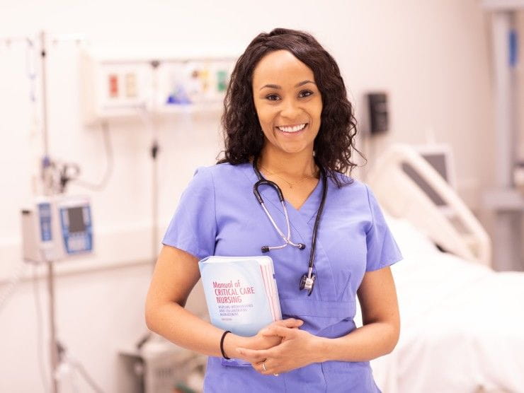 nurse holding book 