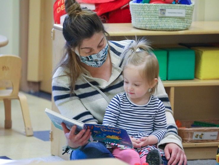 teacher reading to child