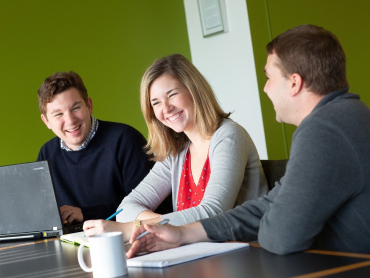 coworkers sitting at table 