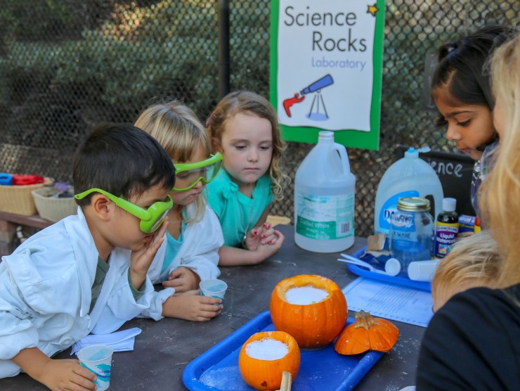 children doing science experiment 