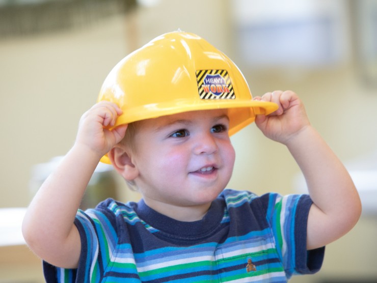 child with hard hat 