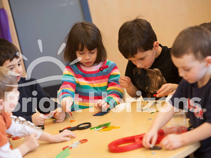 Group of preschoolers doing a magnet activity