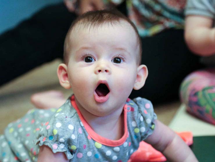 Infant girl with a surprised look on her face|10 Ways Having a Child Changes Your Life|10 ways having a child changes your life