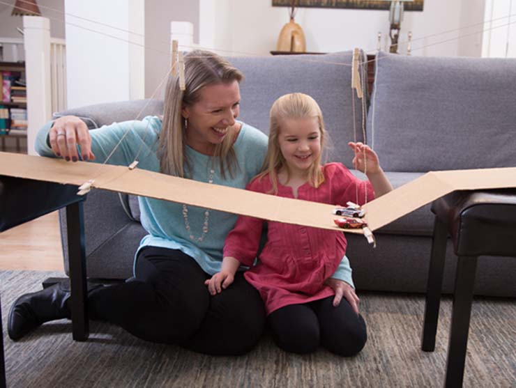mom and daughter trying to build an indoor activity at home