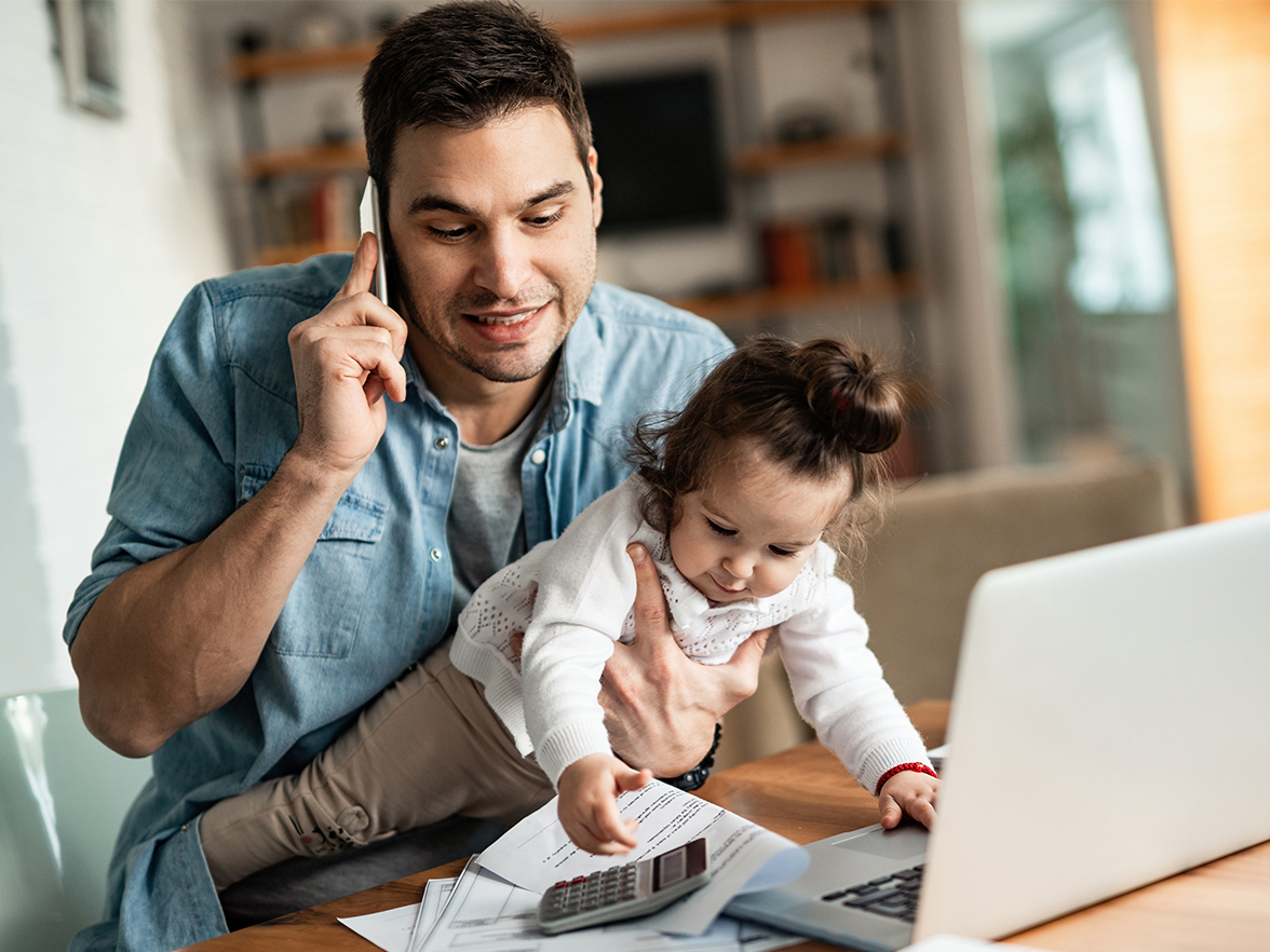 Busy father with infant toddler