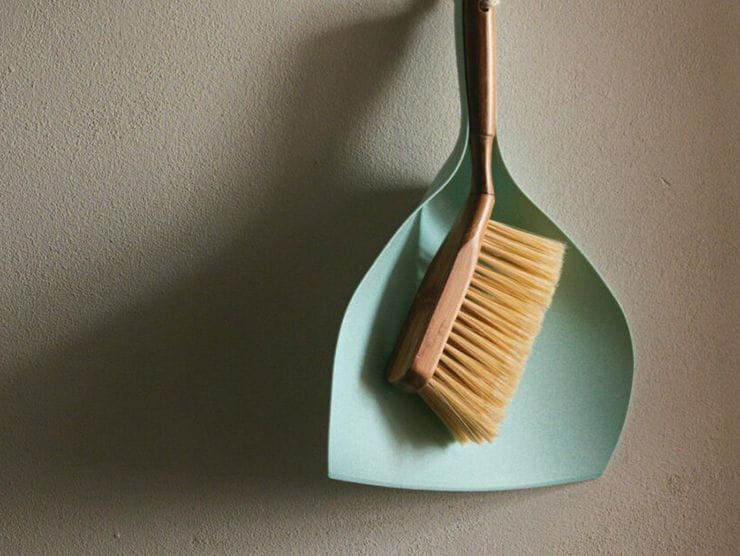 A hand held broom and dust pan teaching kids how to be helpers 