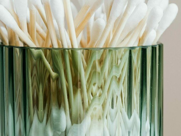 Q-tips in a glass jar 