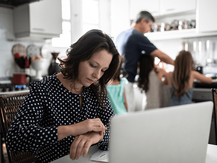 stressed out mother working at home office