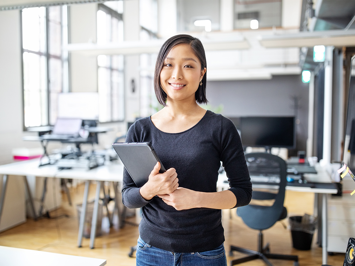 woman smiling at her office