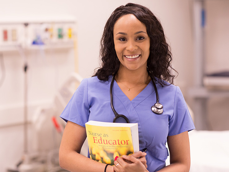 Nurse holding a book