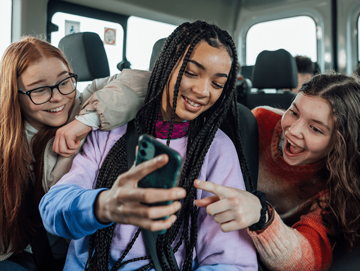Teenage girls browsing social media
