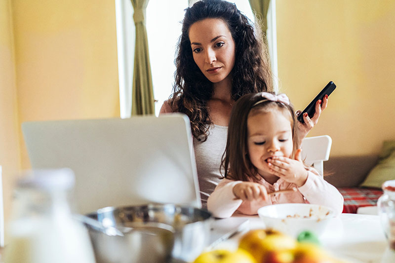 WFH mom caring for her daughter