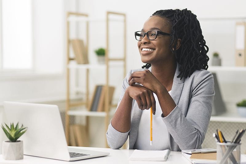 Happy employee upskilling for her job