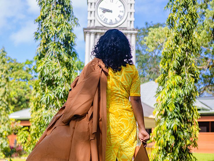 Female working learner going back to school on campus