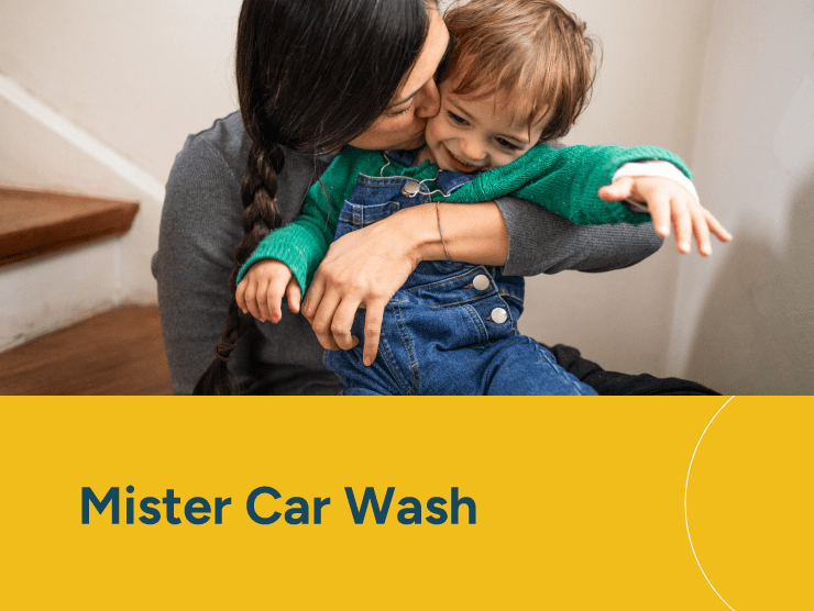 Mister Car Wash with a mother kissing her child on the cheek