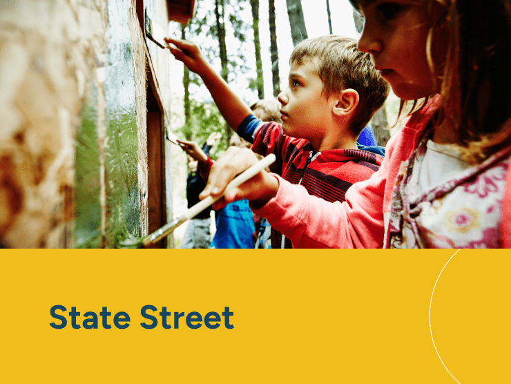 State Street with children painting a wall