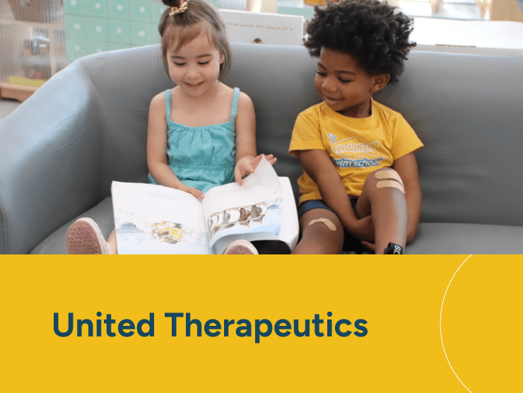 United Therapeutics with two children reading together