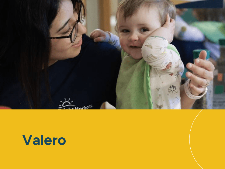 Valero with caregiver and a child