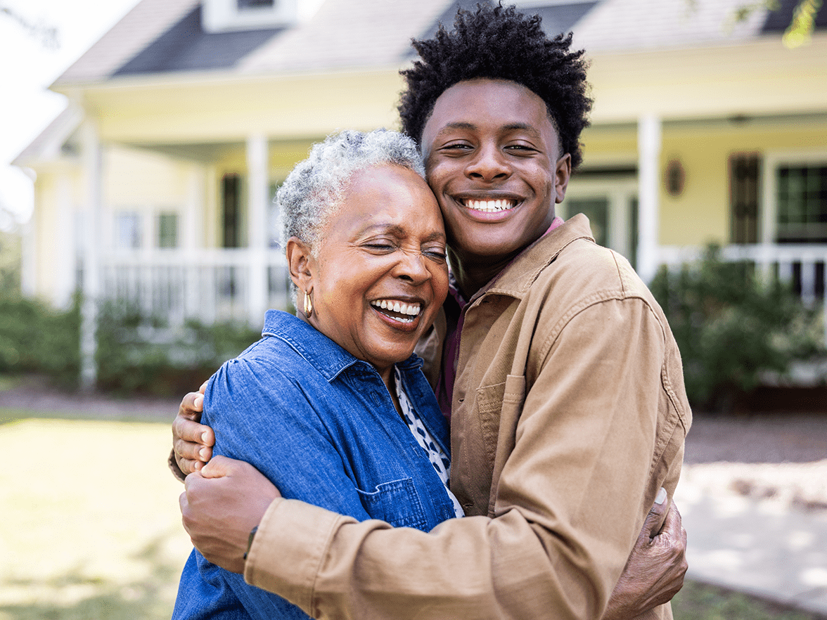 High school student hugging family member