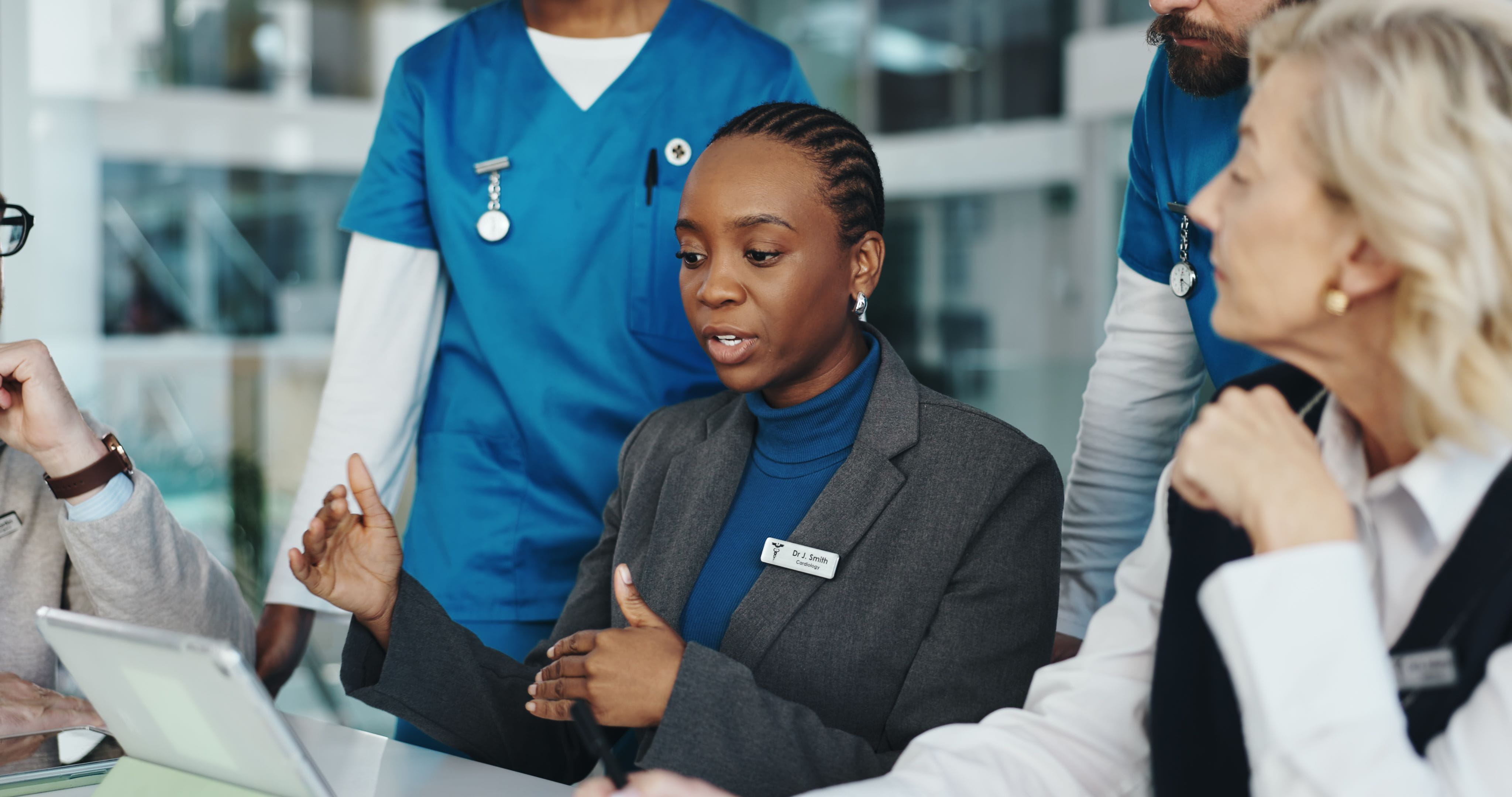 Woman sharing updates with team.