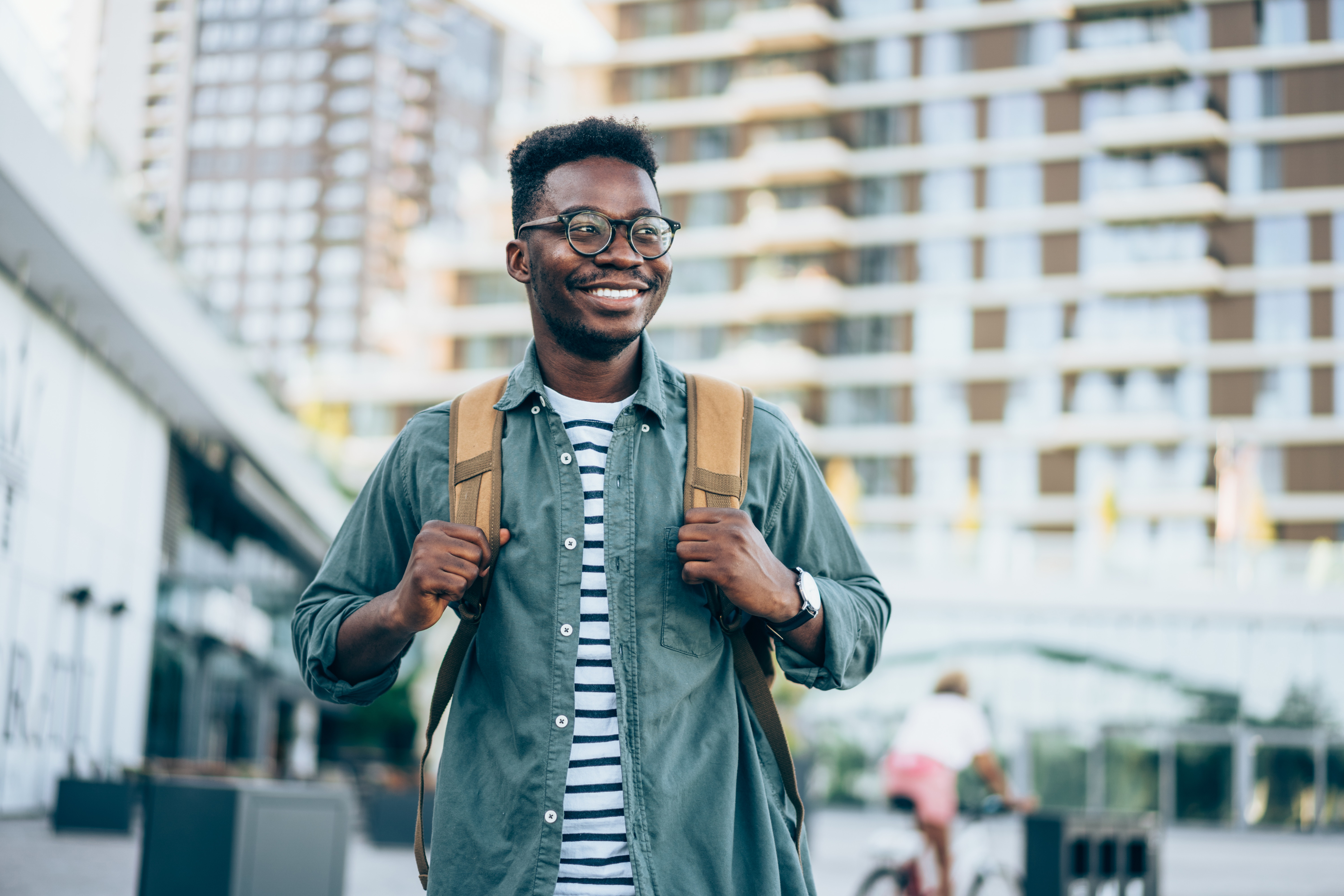 Smiling man with backpack 
