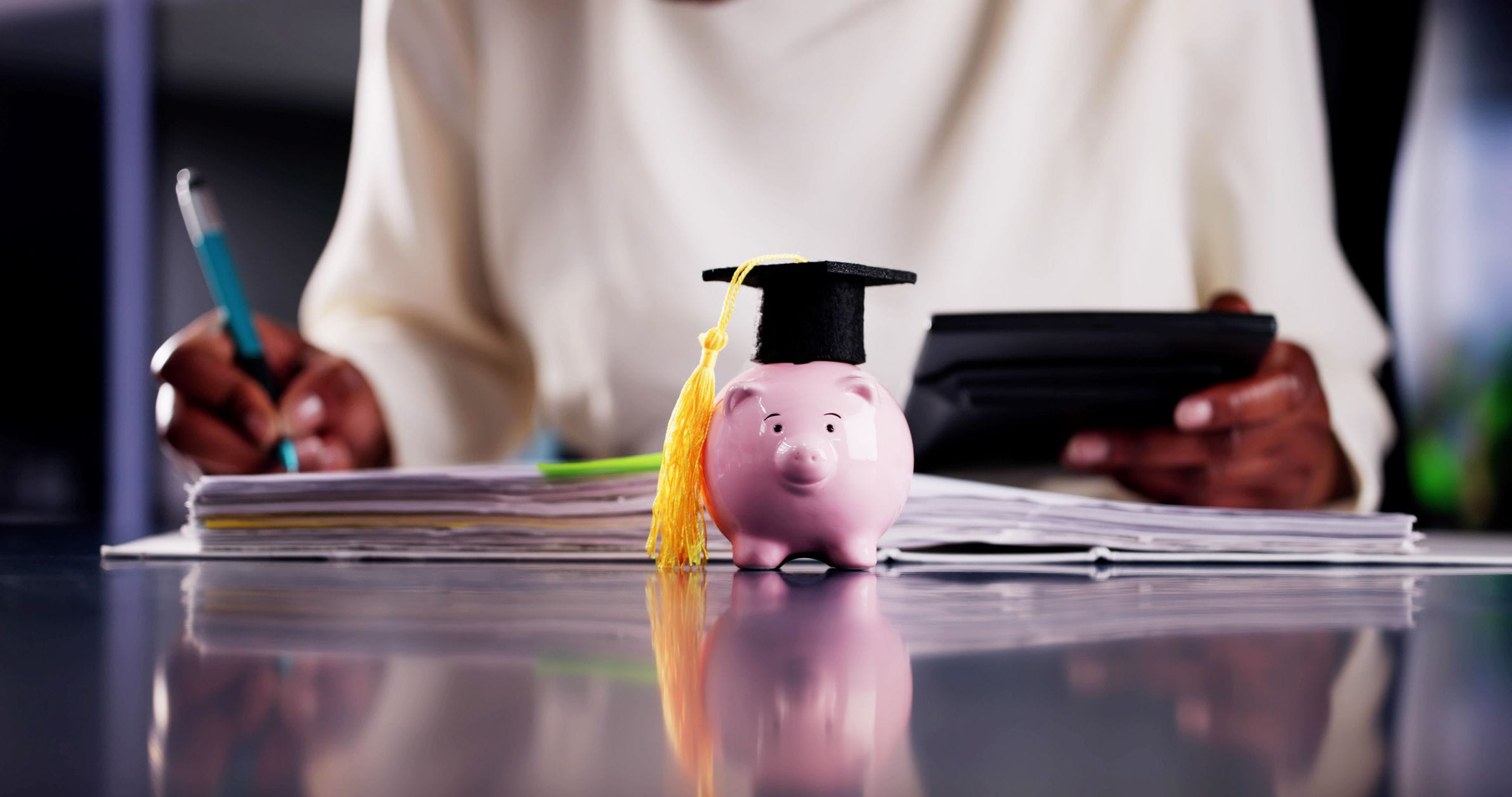 piggy bank with graduation cap