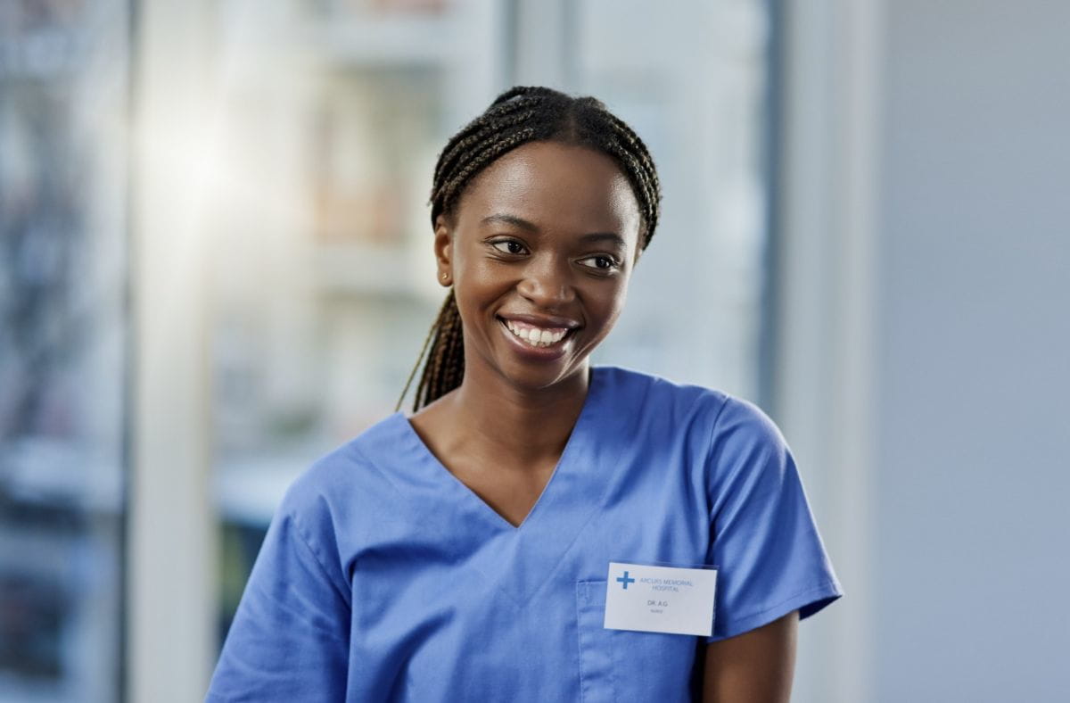 happy nurse in scrubs