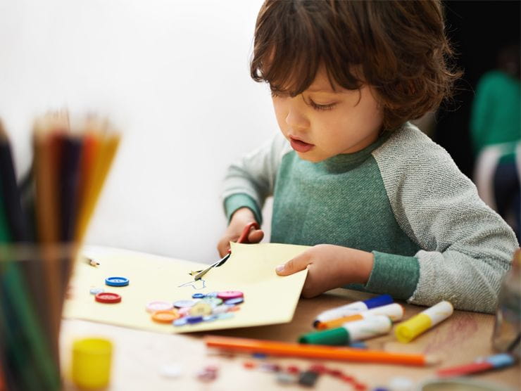 Toddler doing arts and crafts