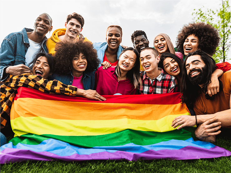 Pride people holding rainbow flag