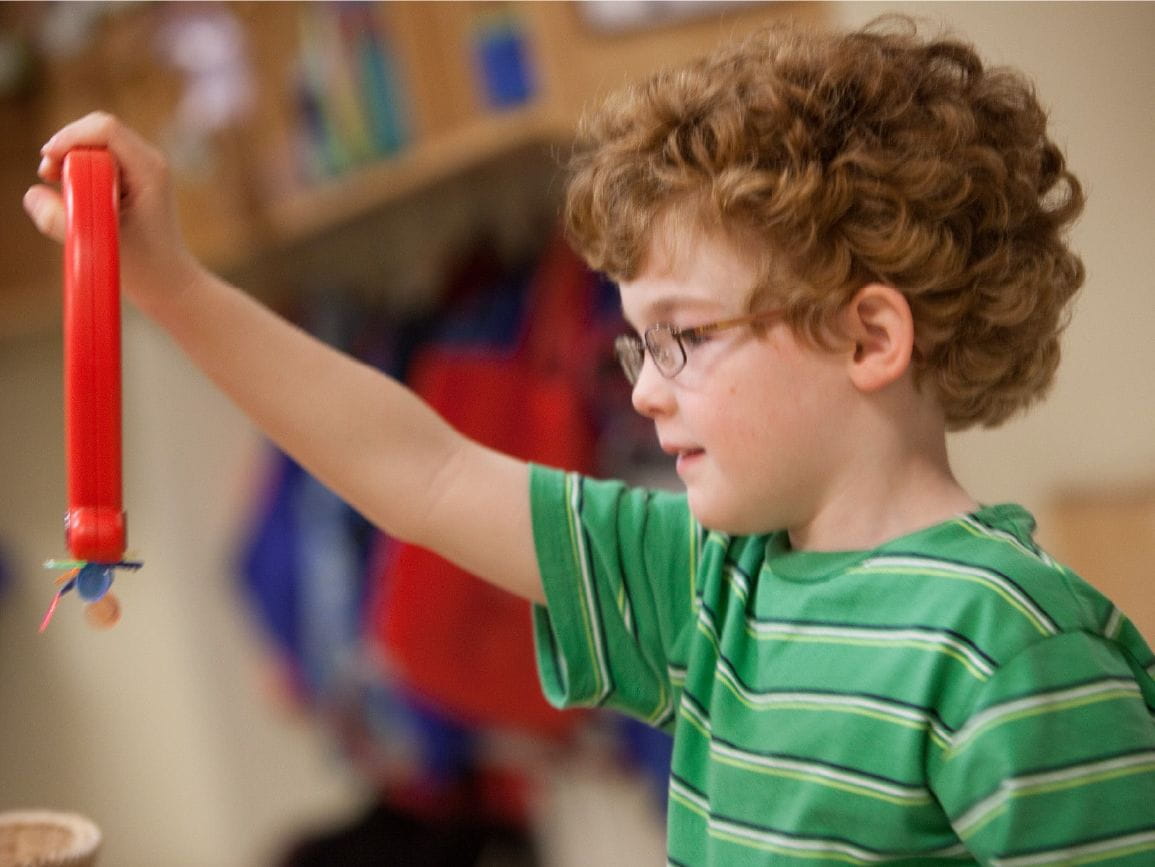 Child playing with toy