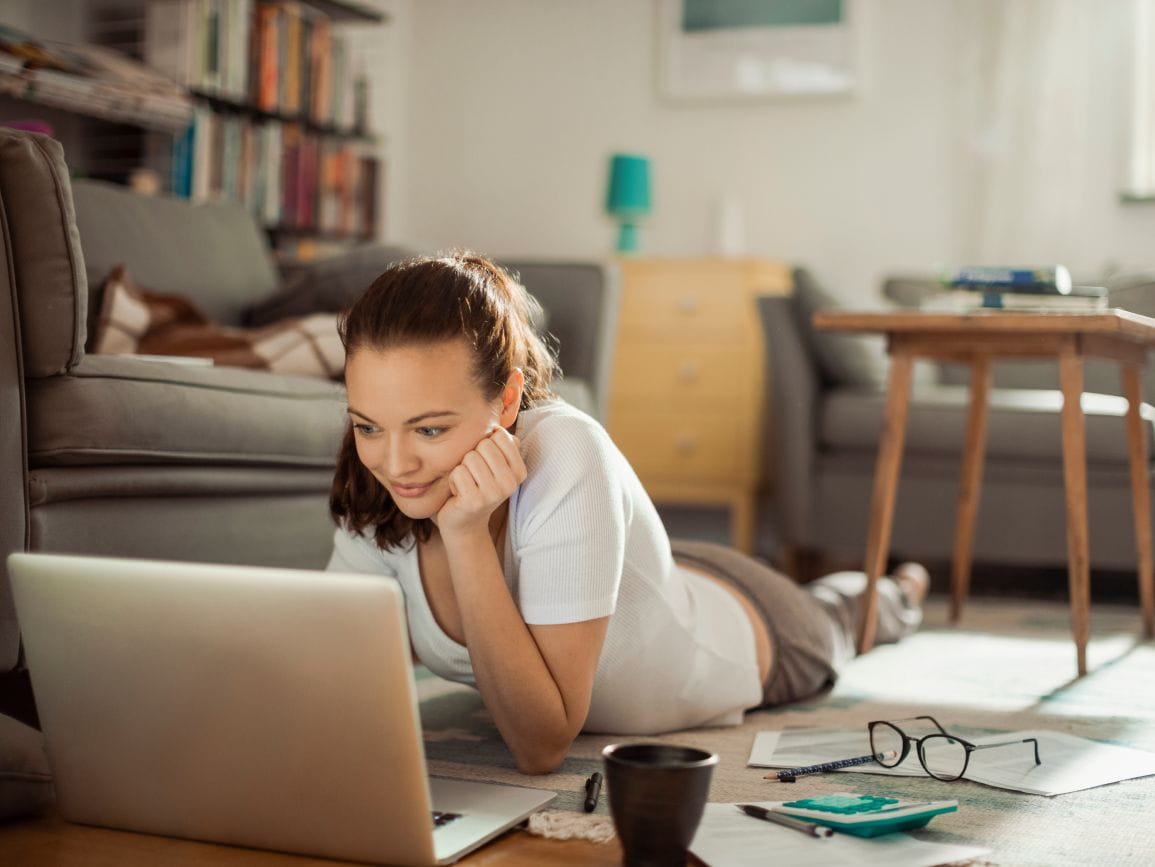 teenage girl working on college essays