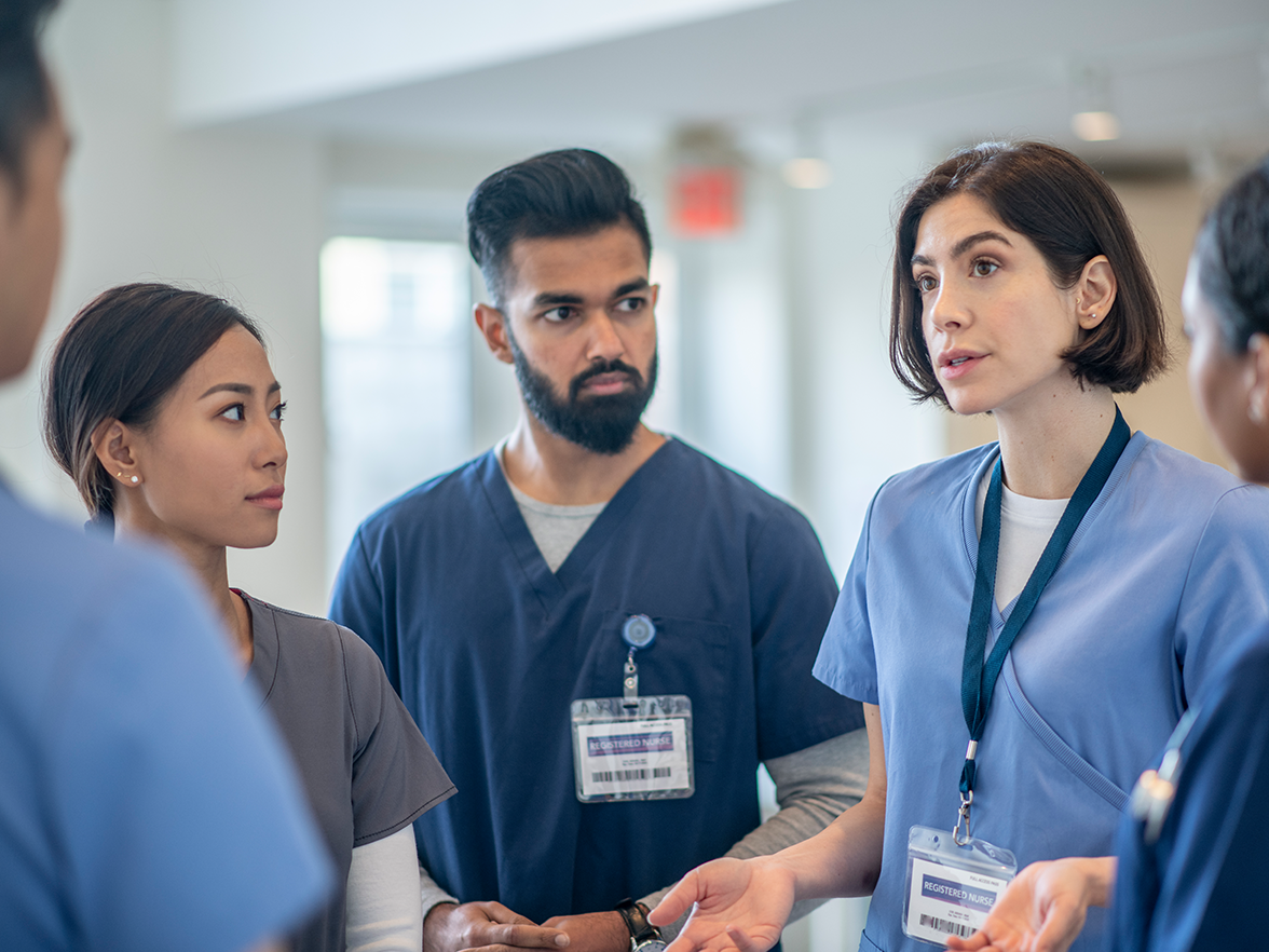 Healthcare workers in discussion