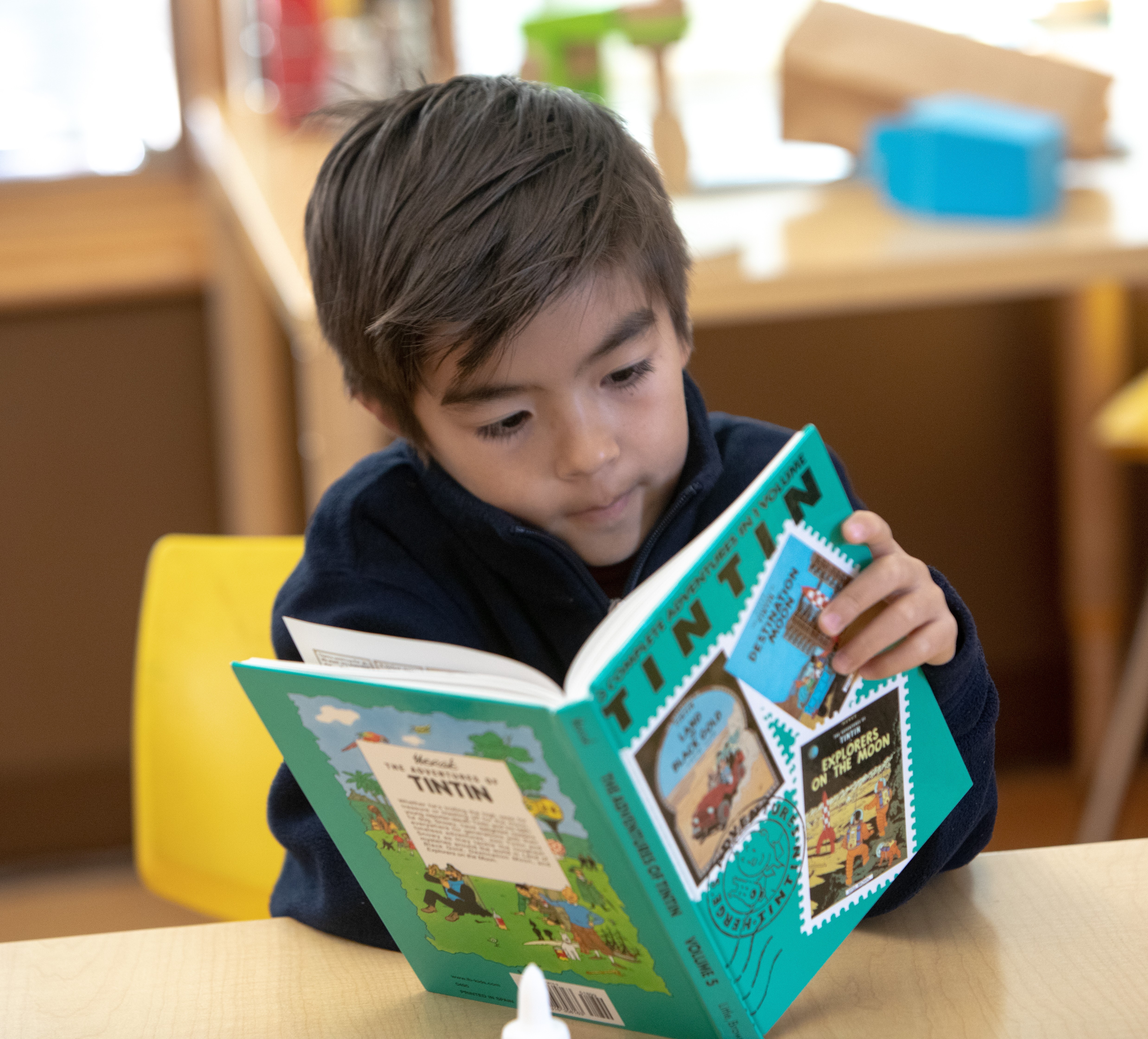 Young boy learning to read at daycare | Bright Horizons| Kindergarten 