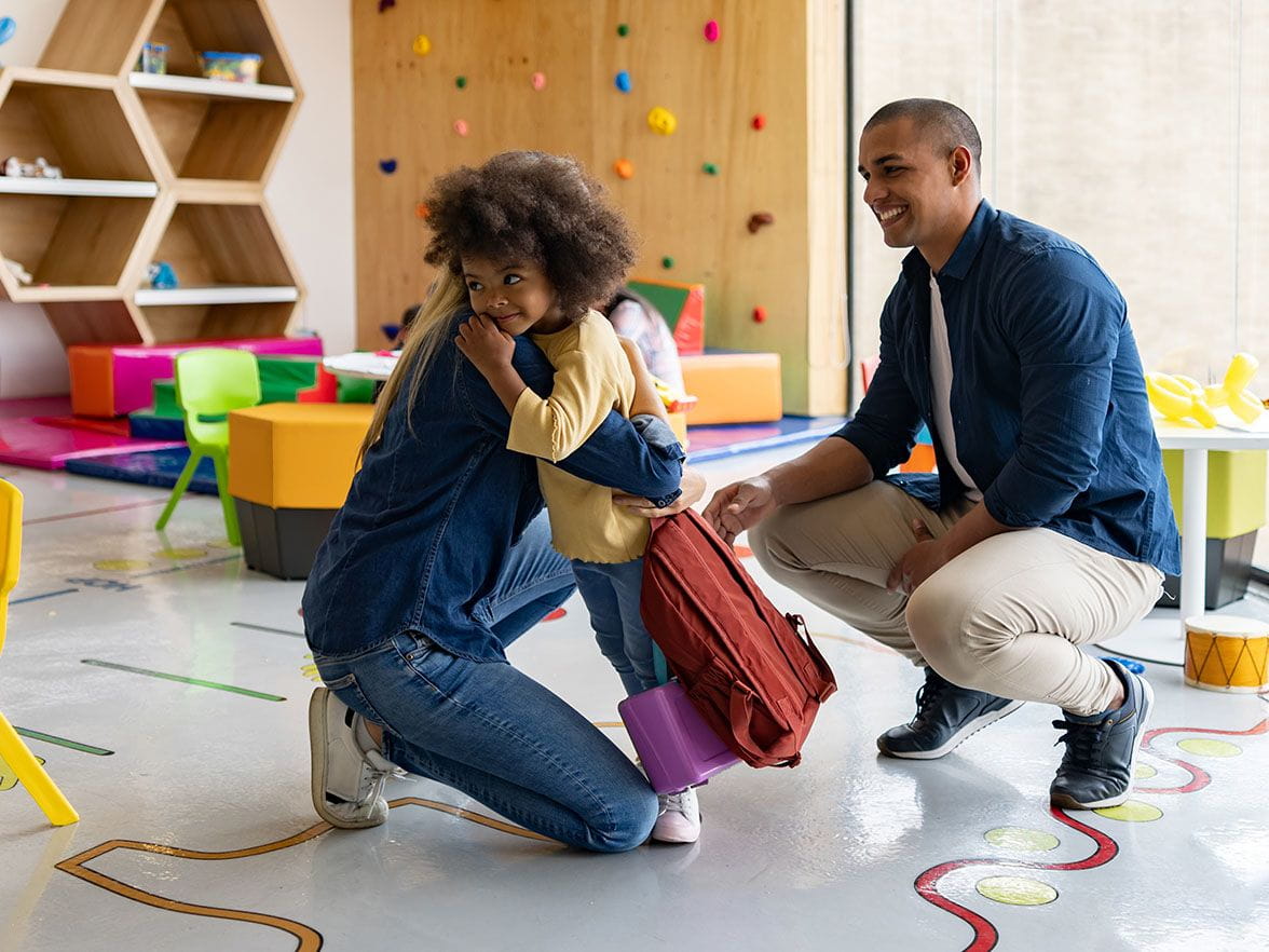 Parent dropping child off at center