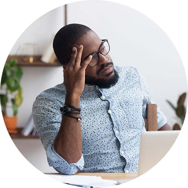 Bright Horizons Modern Family Index Man Thinking at Desk