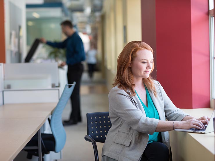 Woman working at laptop