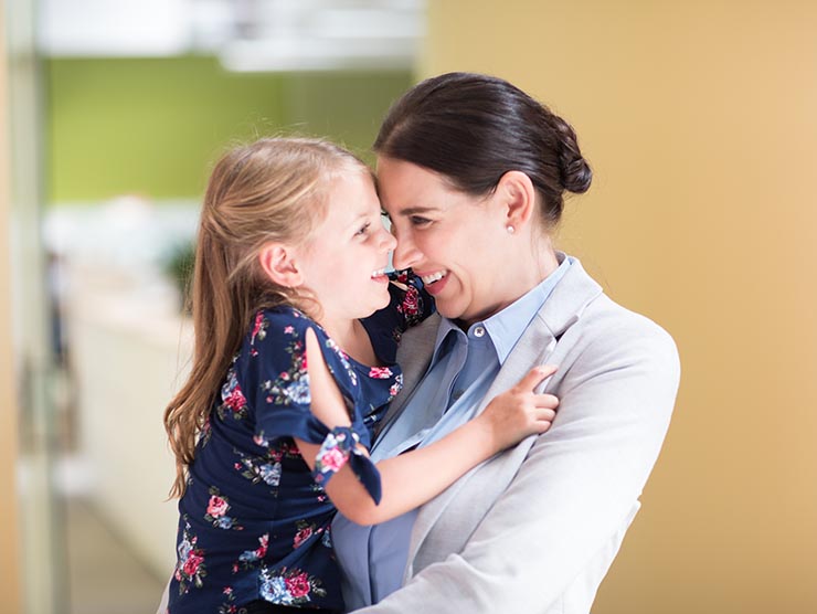 Working mother and young daughter