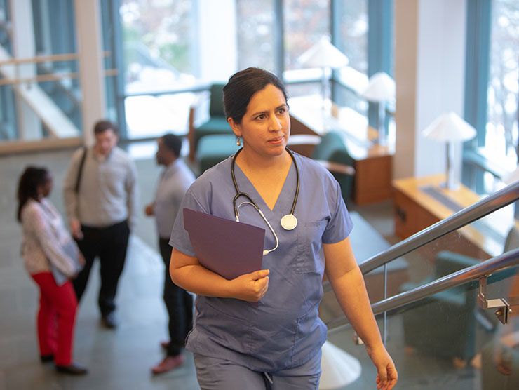 Healthcare professional in scrubs