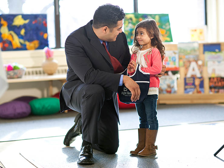 Father and daughter at center