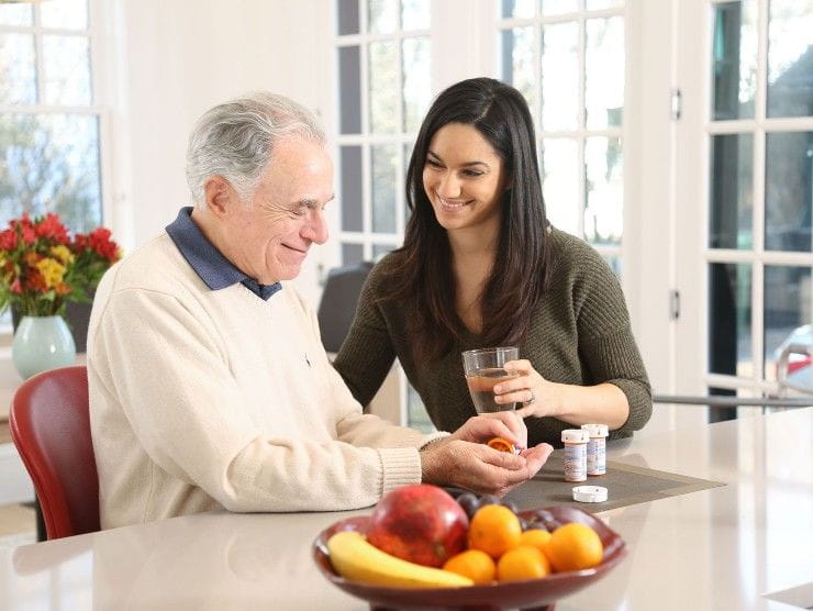 elder with caregiver