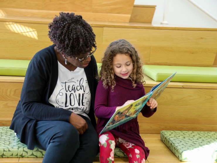 teacher reading with child 