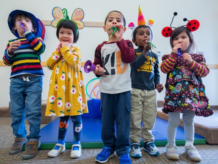 a group of children standing 