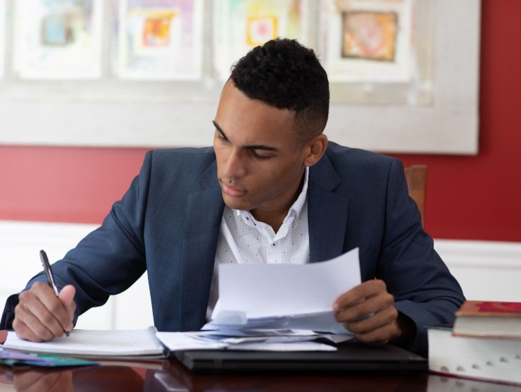 man with notebook