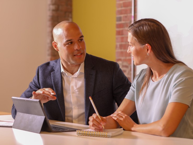 coworkers sitting at table