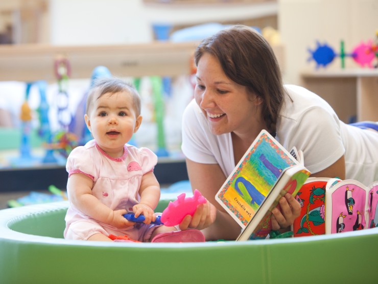 teacher reading to child 