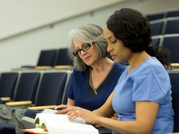 adult learners reading books